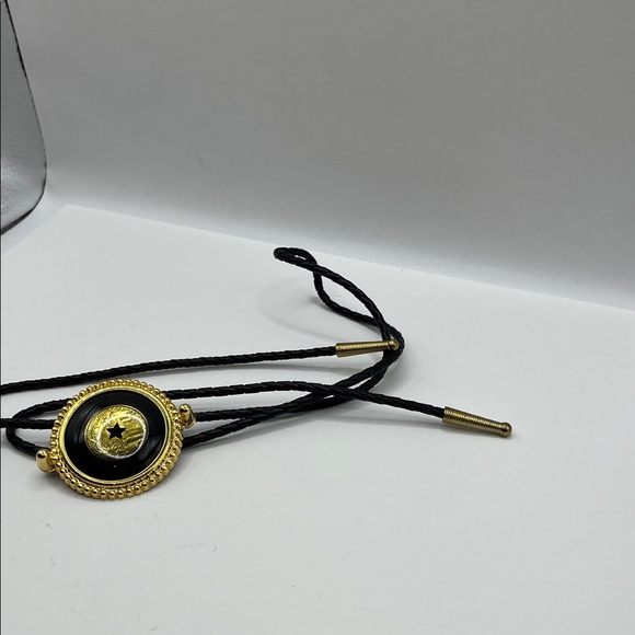 Black and Gold Bolo Tie with Circular Pendant with Star Center Black Braided - Picture 15 of 16